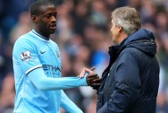 Yaya Toure and Manuel Pellegrini Manchester City