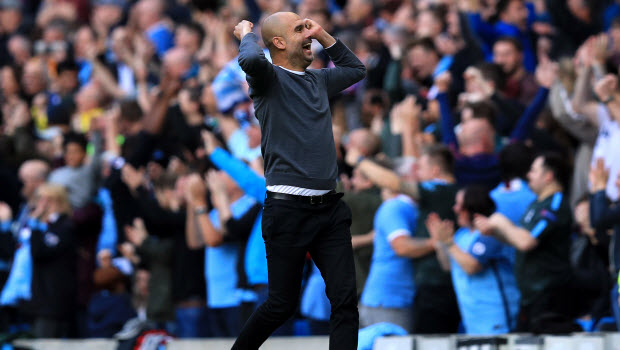 Manchester City manager Pep Guardiola celebrates a goal during the Premier League match at Etihad
